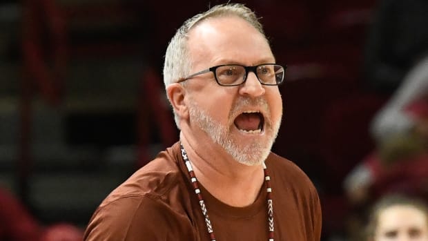Razorbacks coach Mike Neighbors on the sidelines against UCA on Monday night